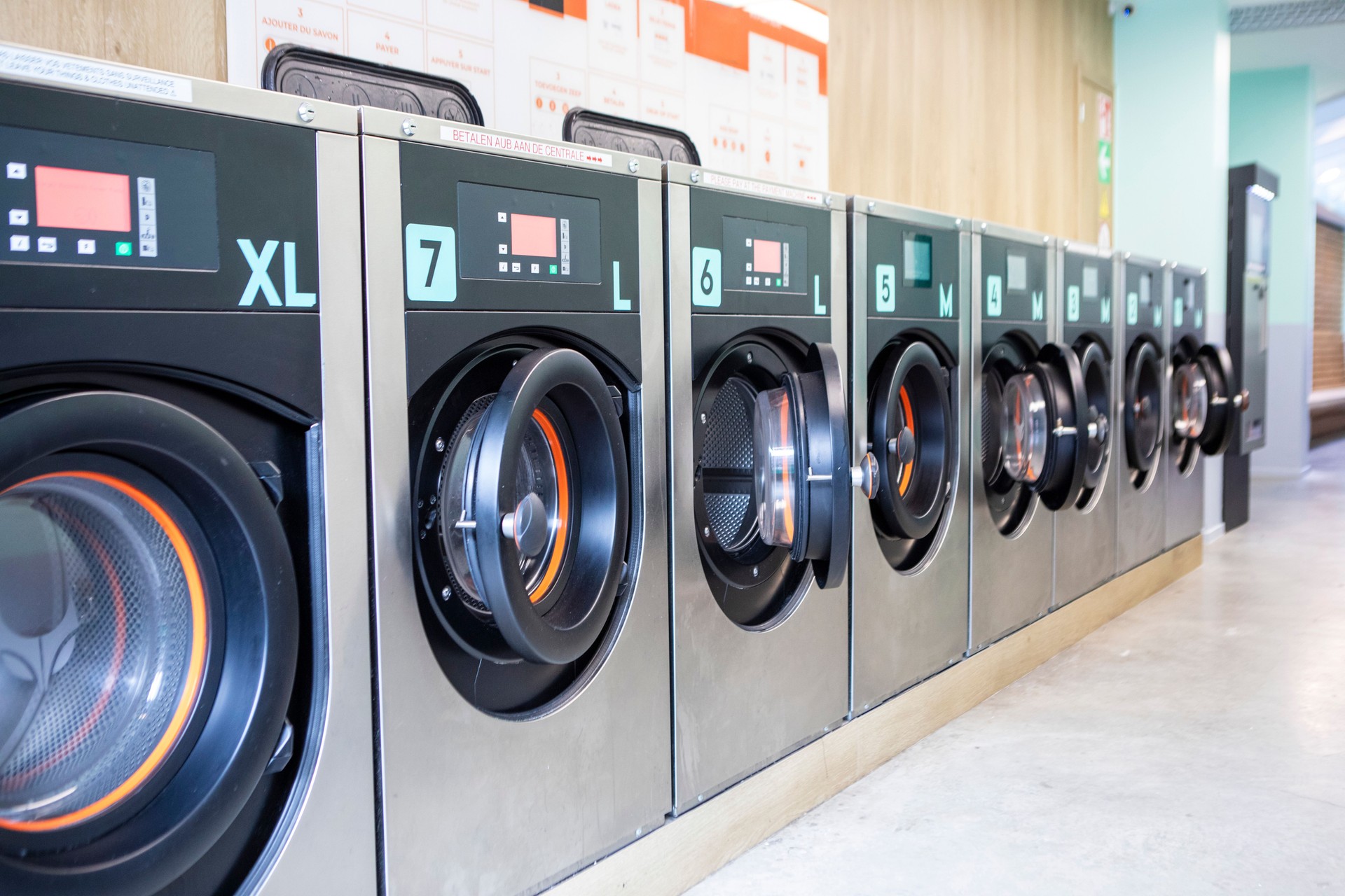 Row of washing machines in a launderette